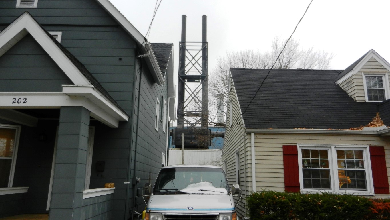 Madison-Kipp Aluminum
            Furnace Stacks Behind Homes